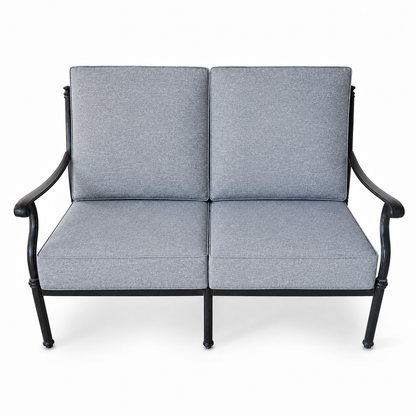 Cast aluminum outdoor loveseat with gray olefin cushions